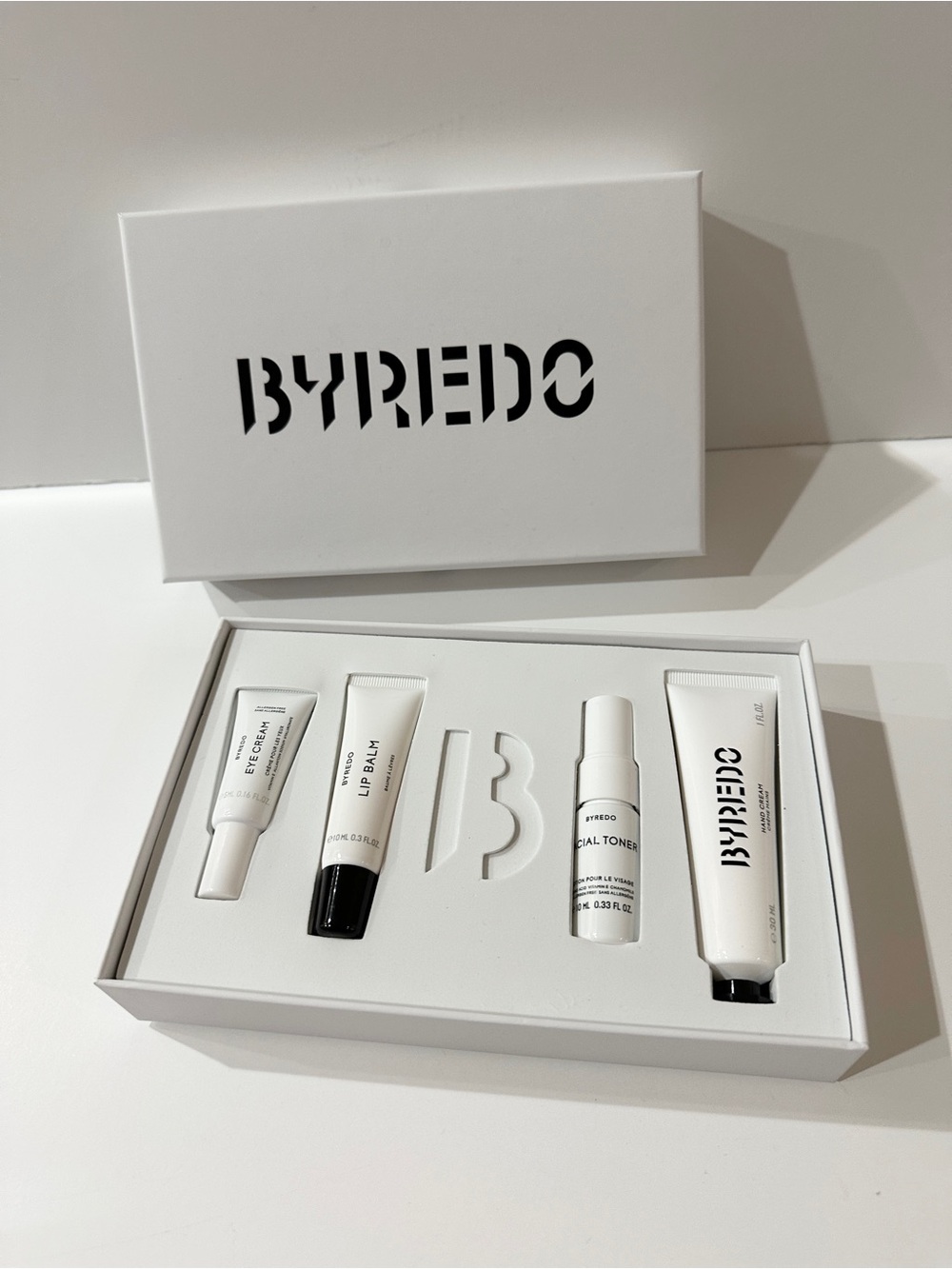 NWOT BYREDO Travel Skincare & Lip Gift Set